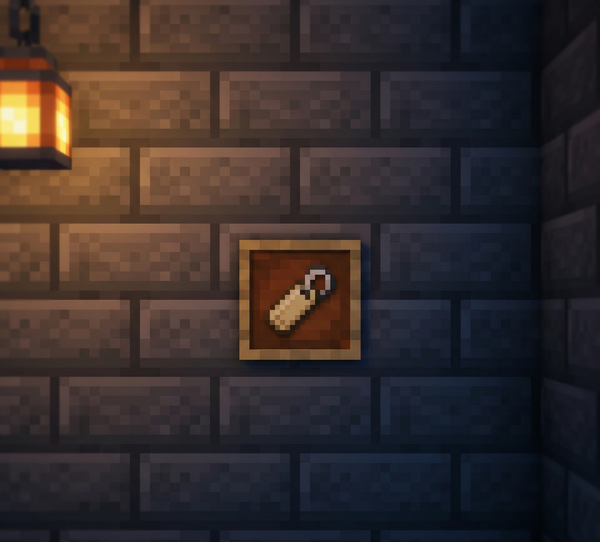 A Minecraft name tag mounted in an item frame on a stone-brick wall, lit by warm lantern light.